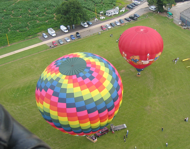 Every year Blake House Craft Centre grows a field of maize and in late summer it is tall enough to be cut to create a maze for visitors to walk in. There have been some great designs over the years and here are just a few that we have snapped on our Essex balloon rides from Blake House over the years.