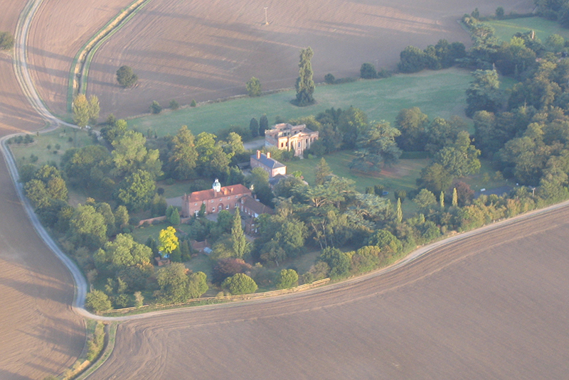 Here are a series of pictures taken from the air on balloon rides over Essex of the remains of the Georgian mansion, Felix Hall. This architectural oddity has a habitable ground floor area inside the burned out remains which remain structurally sound. The landscaping and trees of the original setting of the now divided properties on the site can be appreciated from these excellent aerial views taken from the steady platform afforded by a hot air balloon basket as it drifts past

Click here
&nbsp;To find out how much a balloon flight over Essex costs
