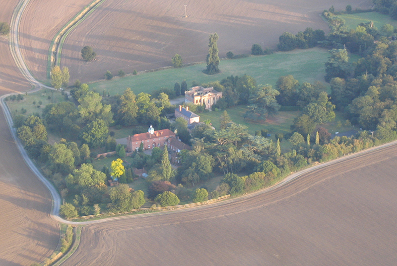 Here are a series of pictures taken from the air on balloon rides over Essex of the remains of the Georgian mansion, Felix Hall. This architectural oddity has a habitable ground floor area inside the burned out remains which remain structurally sound. The landscaping and trees of the original setting of the now divided properties on the site can be appreciated from these excellent aerial views taken from the steady platform afforded by a hot air balloon basket as it drifts past

Click here
&nbsp;To find out how much a balloon flight over Essex costs
