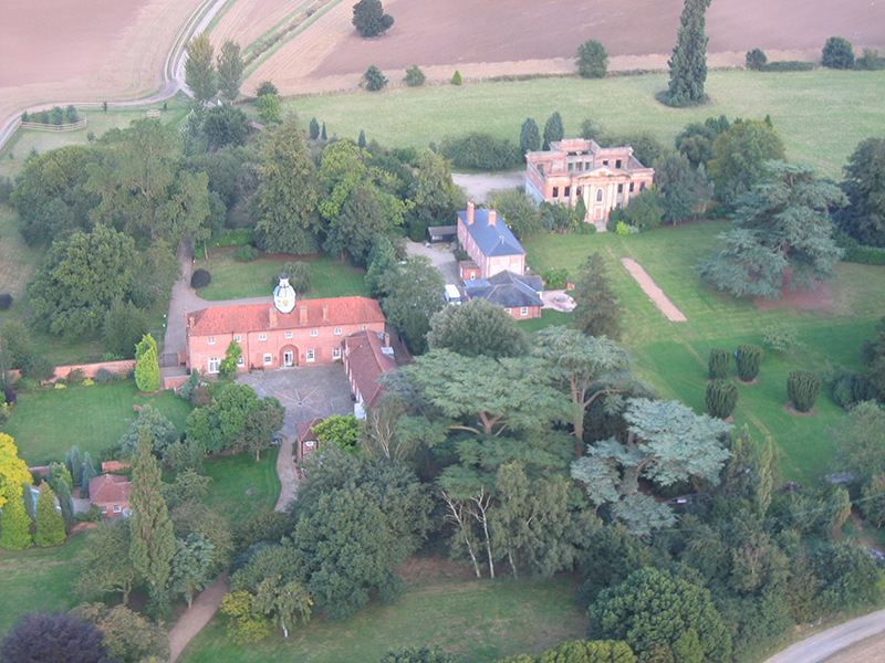 Here are a series of pictures taken from the air on balloon rides over Essex of the remains of the Georgian mansion, Felix Hall. This architectural oddity has a habitable ground floor area inside the burned out remains which remain structurally sound. The landscaping and trees of the original setting of the now divided properties on the site can be appreciated from these excellent aerial views taken from the steady platform afforded by a hot air balloon basket as it drifts past

Click here
&nbsp;To find out how much a balloon flight over Essex costs
