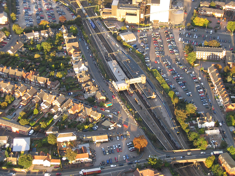 An aerial picture of Greys Mill, a four storey steam and water mill dating from 1856 which is largely complete apart from the chimney of its engine house. This is typical of the fine buildings that Essex will surprise you with on your balloon ride if you keep a good eye out. Also here is a good aerial view of Kelvedon railway station