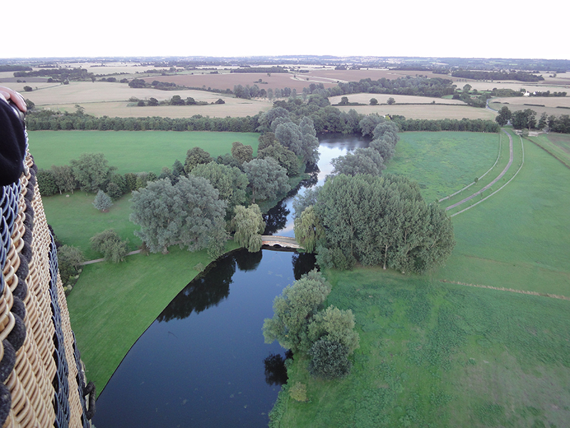 An Essex Balloon ride flies over the remains of Rivenhall Airfield at Silver End. Most of the runways have been dug up for construction material and beneath the natural gravel is now being extracted for the same purpose. A second view is from the balloon basket flying low level over the Essex countryside close to Silver End village which was home to the Crittall Windows production facility when it expanded from Braintree in 1926