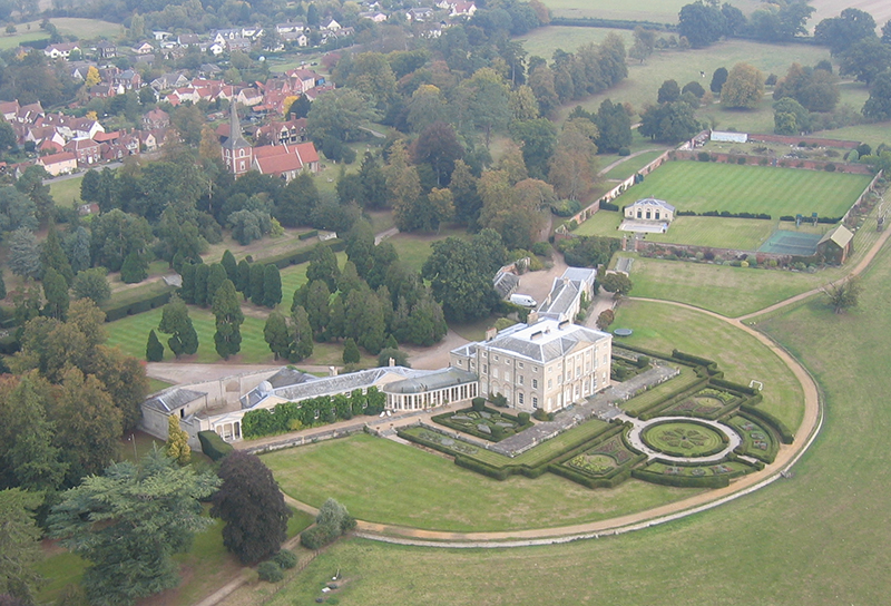 Terling Place, midway between Chelmsford and Witham in Essex is a regular view on Essex balloon rides. The family seat of Lord Rayleigh, this large Georgian house was built between 1772 and 1777 with additions in 1818 and 1824. The family name is Strutt and there are family connections to well known estate agency Strutt and Parker and the family has 8 arable farms over East Anglia producing in a typical year 50,000 tones of wheat for breadmaking, sugar beet and potatoes.
Click here
To check out our Essex balloon ride prices.