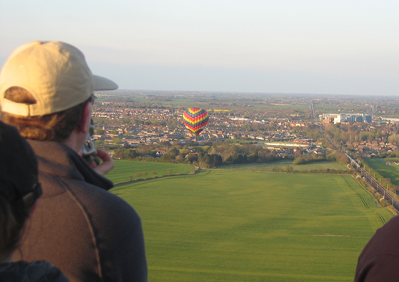 Your balloon ride over Essex will often be in the company of other balloons and here we are following a balloon approaching the small town of Witham, midway between Colchester and Chelmsford